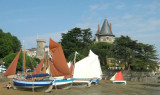  Overview of the castle with traditional boats beached by Coques en Bois (wood hulls)